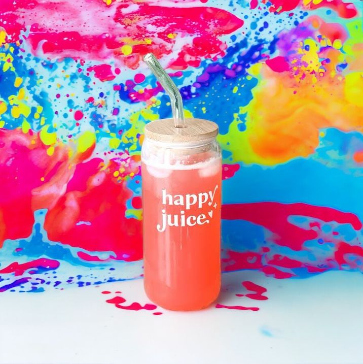 Amare Happy Juice – Natural drink for mood enhancement and gut-brain axis support against a brilliantly bright multicoloured background.