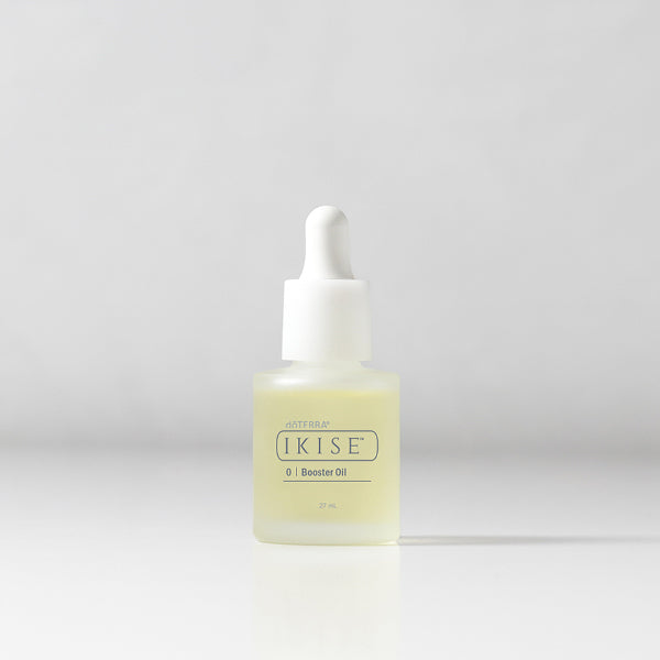Skincare bottle labeled 'ikise' on a light gray background