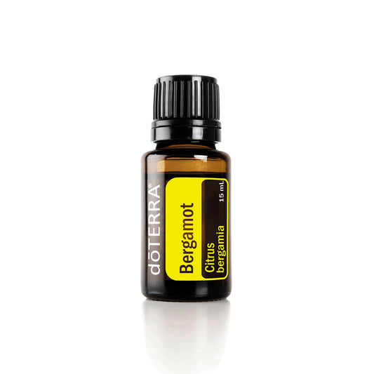doterra bergamot essential oil bottle on a white background