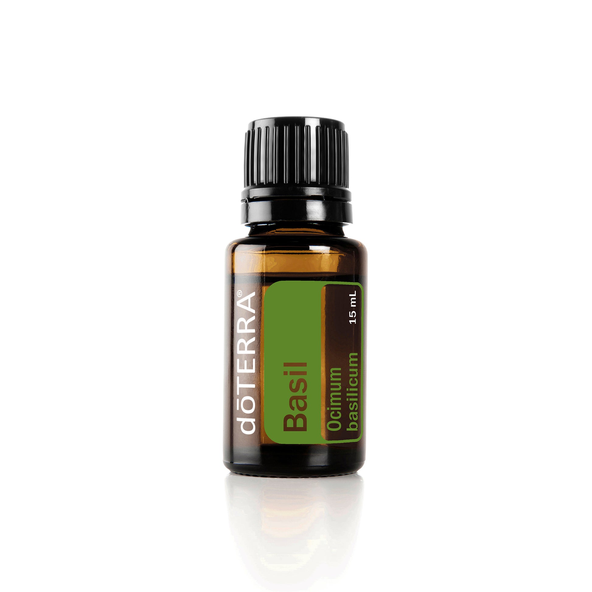 A bottle of doTERRA Basil essential oil with a green label indicating the scent and brand.