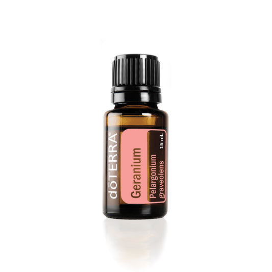 A bottle of doTERRA Geranium essential oil with a label showing the brand and product name.